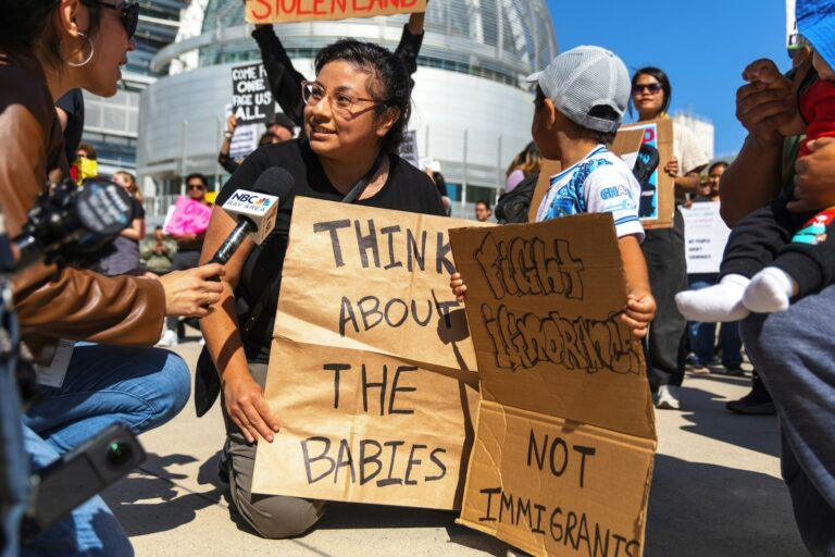 Protesters advocate for immigrants' rights.